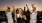 Friends dancing on the roofdeck at sunset 